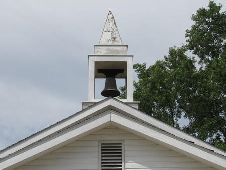 Church bell on a cloudy dayの写真素材