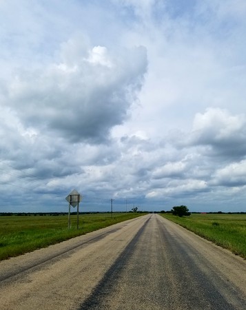 Stretching road on a stormy dayの写真素材