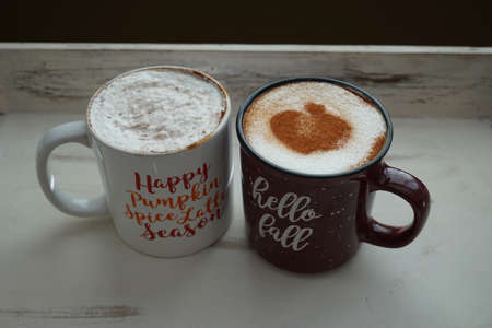 Pair of mugs on a serving trayの写真素材