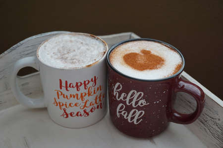 Coffee mugs on a breakfast trayの写真素材