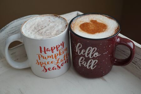 Two lattes on a serving trayの写真素材