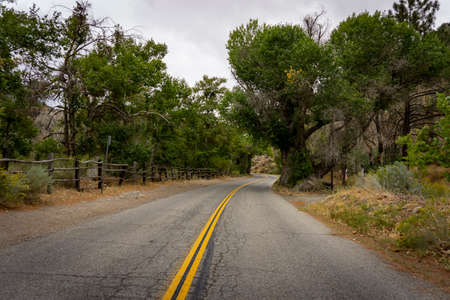 Old highway along a riverの写真素材
