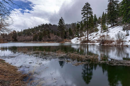 Reflective lake in the mountainsの写真素材