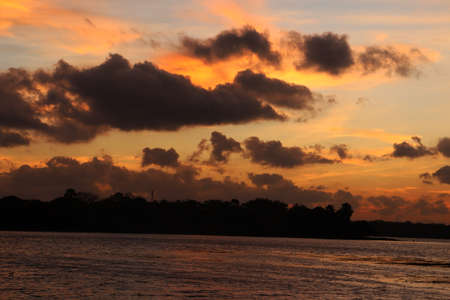 the evening sun hiding on the horizon