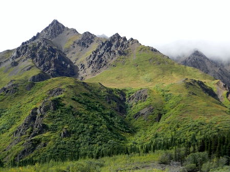 Mountain disappearing into the cloudsの写真素材