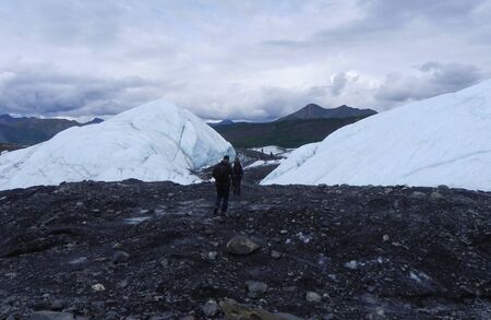 Walking through glacier iceの写真素材