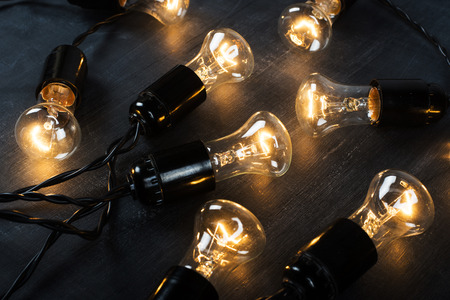 Light bulb lamp on blackboard backgroundの写真素材