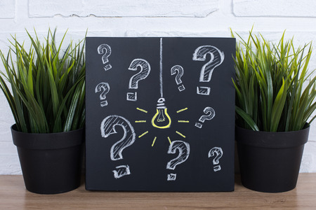 Idea Light Bulb on Blackboardの写真素材