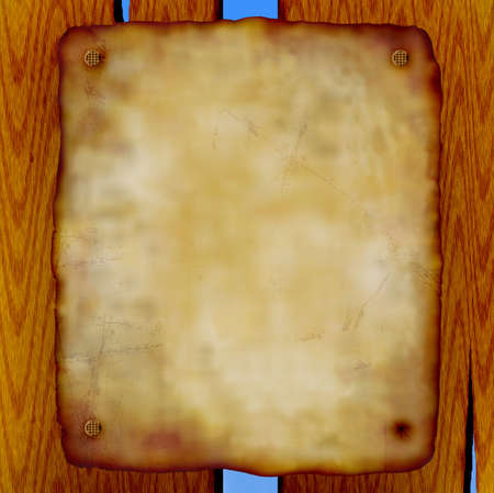 old scroll nailed to a wooden fenceの写真素材