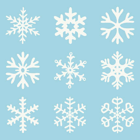 vector set of white snowflakes isolated on blue background. abstract snowflake drawing collection for christmas and winter illustrationsのイラスト素材