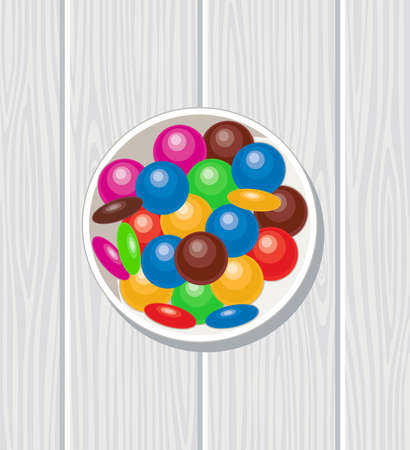 A bowl of rainbow colors and chocolate candy on gray wooden tableのイラスト素材