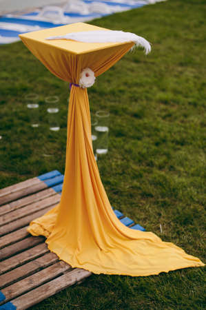 Original wedding floral decoration in the form of mini-vases and bouquets of flowers hanging from the ceilingの写真素材