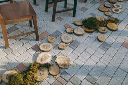 Original wedding floral decoration in the form of mini-vases and bouquets of flowers hanging from the ceilingの写真素材