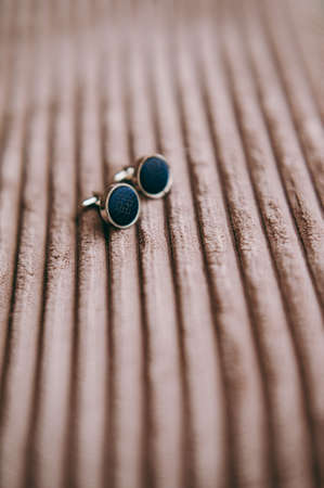groom's cufflinks in a box