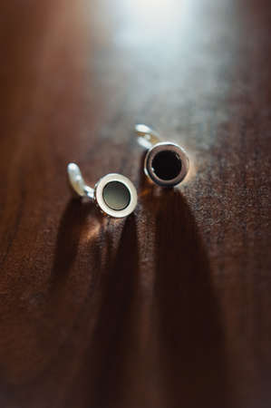 groom's cufflinks in a box
