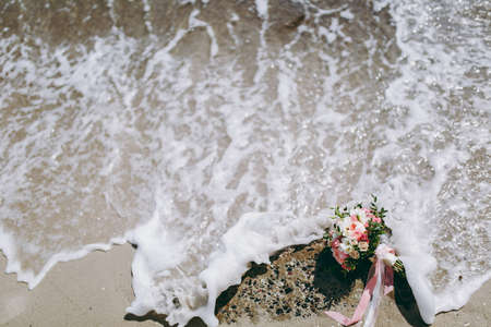 Beautiful bouquet of the bride in different color tonesの写真素材