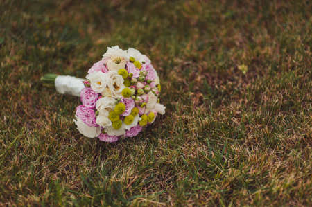 Beautiful bouquet of the bride in different color tonesの写真素材