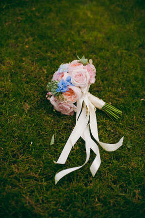 Beautiful bouquet of the bride in different color tonesの写真素材