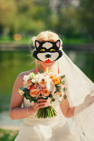 Bride holding big wedding bouquet on wedding ceremonyの写真素材