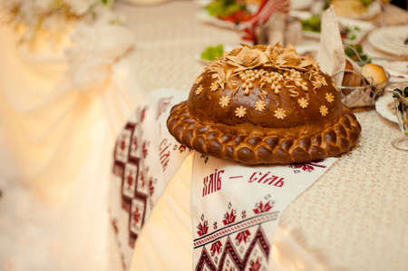 Wedding loaf. Embroidered towel. Bread loamの写真素材