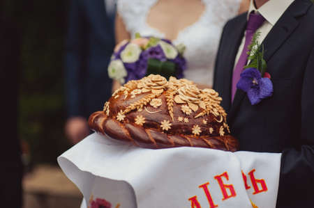 Wedding loaf. Embroidered towel. Bread loamの写真素材