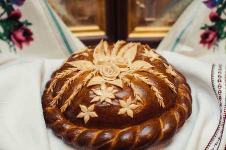 Wedding loaf. Embroidered towel. Bread loamの写真素材