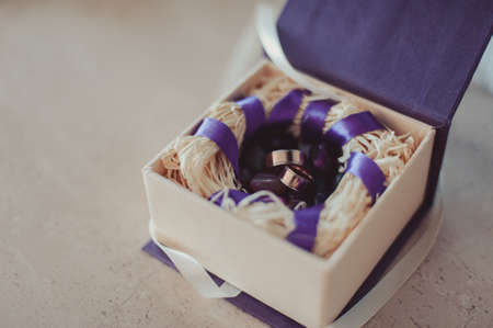 Two wedding rings on the pillowの写真素材
