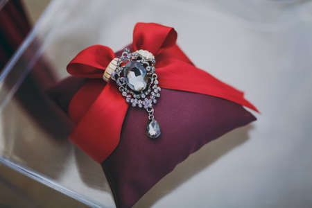 Two wedding rings on the pillowの写真素材