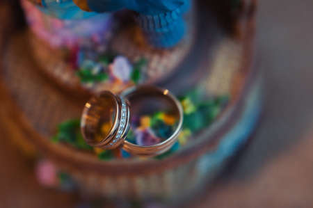 Two wedding rings of the bride and groom close-upの写真素材