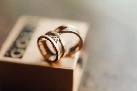 Two wedding rings of the bride and groom close-upの写真素材