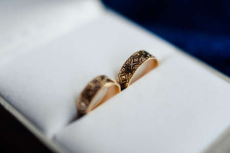 Two wedding rings of the bride and groom close-upの写真素材