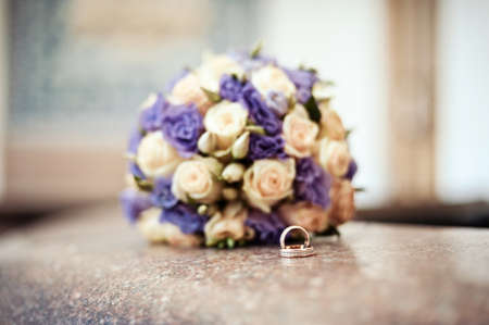 Two wedding rings of the bride and groom close-upの写真素材