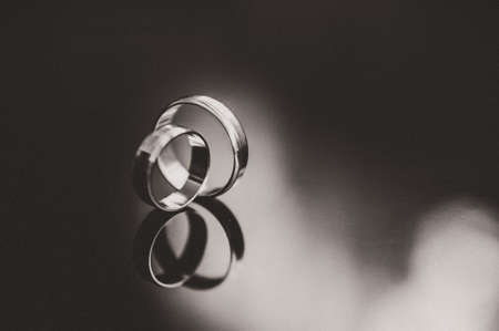 Two wedding rings of the bride and groom close-upの写真素材