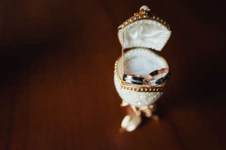Two wedding rings of the bride and groom close-upの写真素材