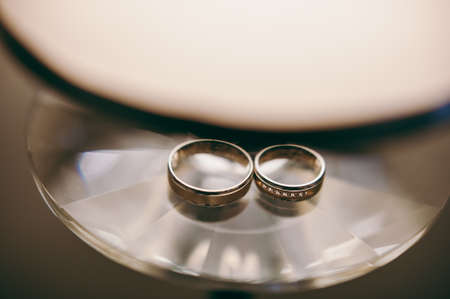 Two wedding rings of the bride and groom close-upの写真素材