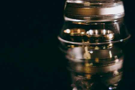 Two wedding rings of the bride and groom close-upの写真素材