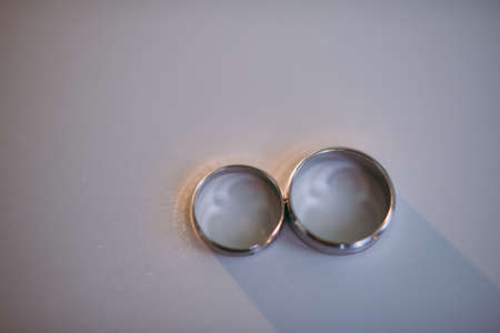 Two wedding rings of the bride and groom close-upの写真素材