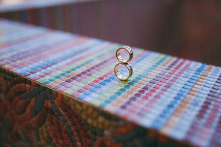 Two wedding rings of the bride and groom close-upの写真素材