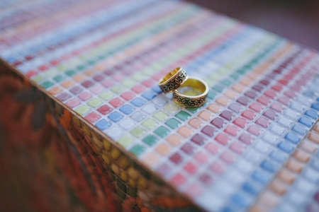Two wedding rings of the bride and groom close-upの写真素材