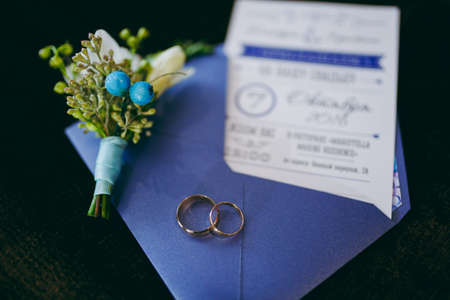 Two wedding rings of the bride and groom close-upの写真素材