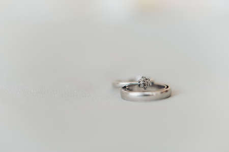 Two wedding rings of the bride and groom close-upの写真素材