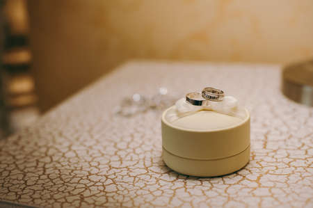 Two wedding rings of the bride and groom close-upの写真素材