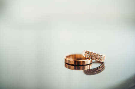 Two wedding rings of the bride and groom close-upの写真素材