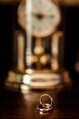 Two wedding rings of the bride and groom close-upの写真素材