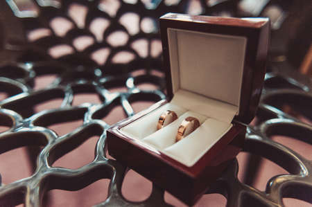 Two wedding rings of the bride and groom close-upの写真素材