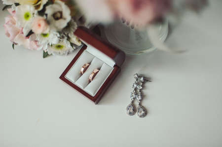 Two wedding rings of the bride and groom close-upの写真素材