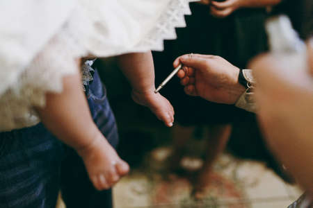 Baptismal ceremony. Altar church bible candles crown cross iconの写真素材