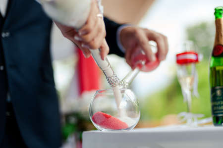 Blending of the sands at wedding ceremonyの写真素材