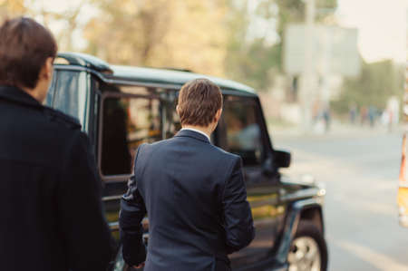 The handsome groom walking alongの写真素材