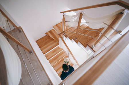 The handsome groom walking alongの写真素材